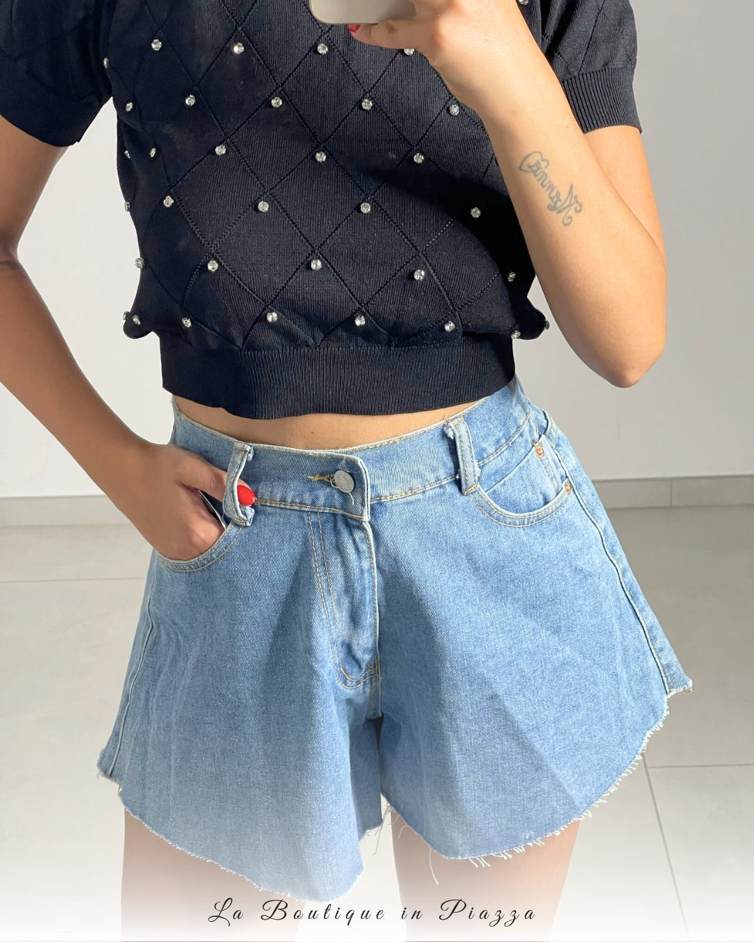 Shorts jeans a farfalla