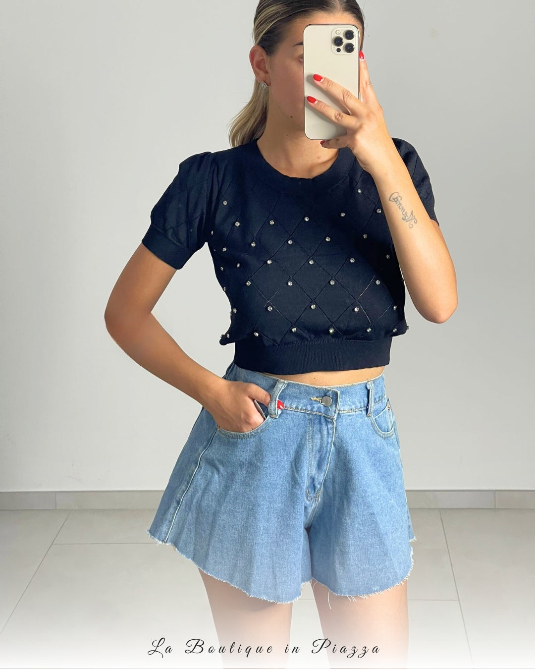 Shorts jeans a farfalla